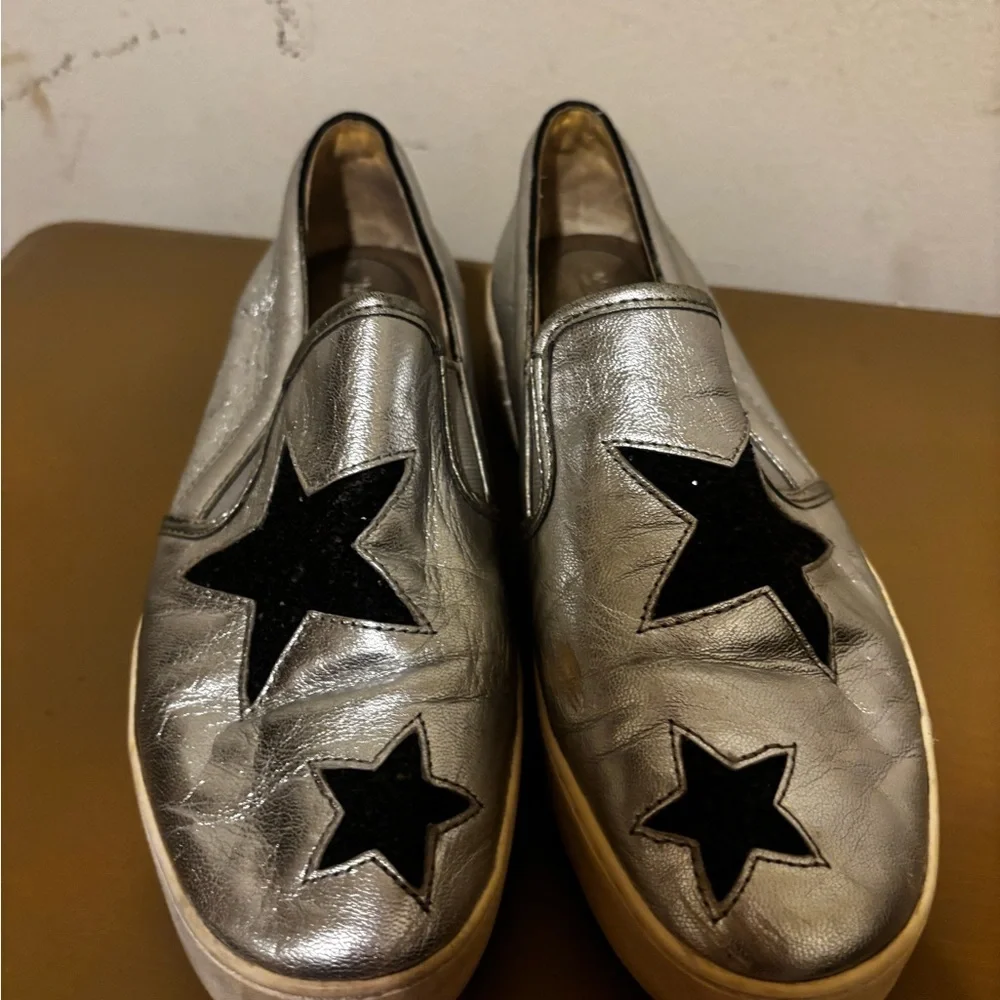 Michael Kors Silver Slip-On Shoes with Black Star Accents